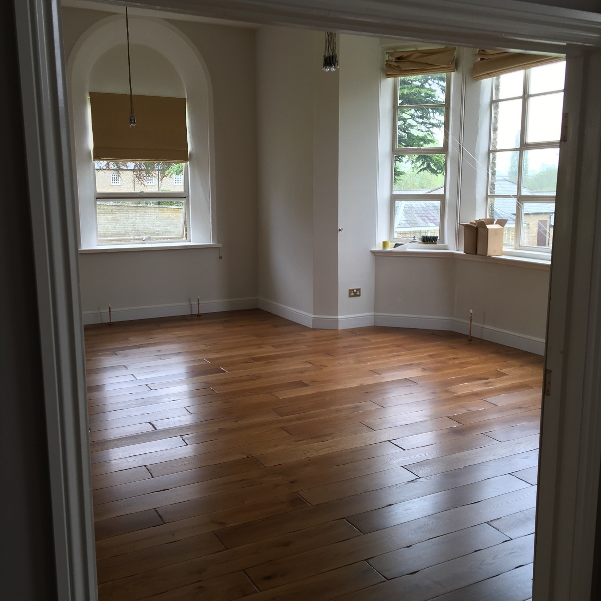 Installed using Hamiltons Woodland Heritage 20mm Oak Amber Planks Lightly Aged. Hardwax Oil Finish