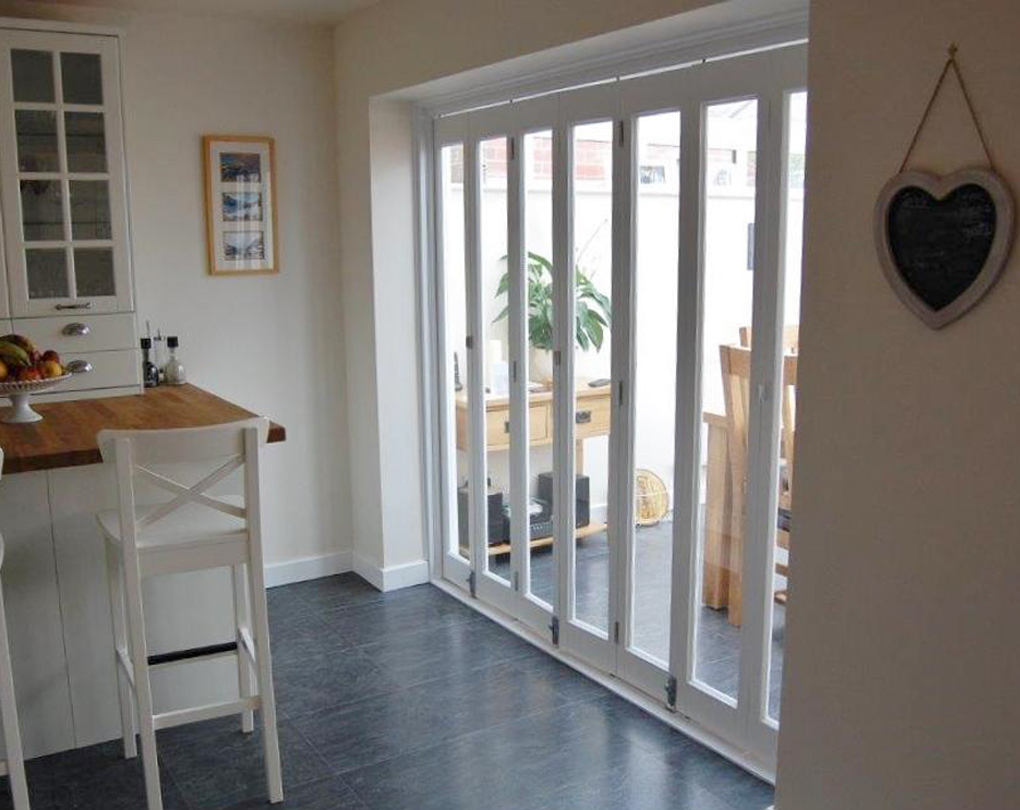 Slimfold White Marston Clear Glass 3 4 5 And 6 Folding Door System Slimfold White Marston Clear Glass 3 4 5 And 6 Folding Door System Save More At Hamiltons Doorsandfloors Co Uk